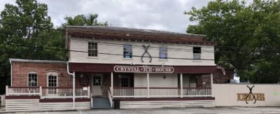Crystal Ice House storefront with covered porch.